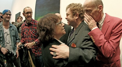 Who doesn’t like gossip? John Waters dishing the dirt with Ingrid Sischy and Sir Elton John at pre-Oscar Gagosian opening. Photo by Eric Minh Swenson