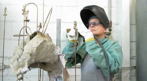 Charles Long in the foundry, putting the finishing touches on a new sculpture for his upcoming show in New York.