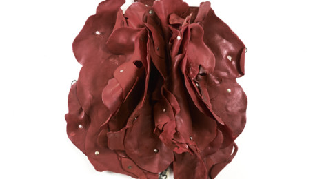 Hannah Wilke, Untitled, 1970, red latex on plywood board, collection of Margaret and Daniel S. Loeb, ©Marsie, Emanuelle, Damon and Andrew Scharlatt, Hannah Wilke Collection & Archive, Los Angeles/Licensed by VAGA, New York, photo: Jamie Grafton Photography