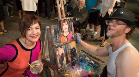 Tulsa Kinney with Alex Schaefer painting her live portrait