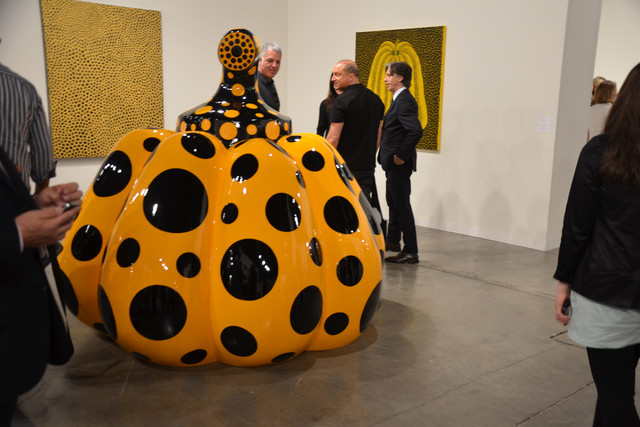 Yayoi Kusama's pumpkin at David Zwirner gallery's booth, priced at $600,000, sold quickly at the private opening of Art Basel Miami Beach yesterday. The fair, open to the public today through Sunday, features 258 galleries from 31 countries. Photographer: Amanda Gordon/Bloomberg