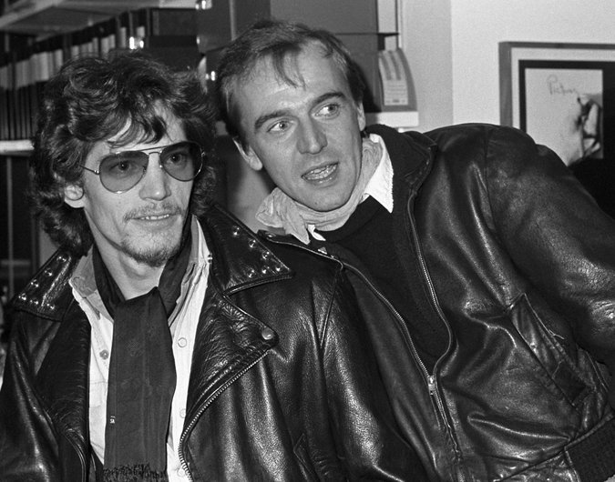 Robert Mapplethorpe, left, at one of his exhibitions with Rene Ricard in 1977. Gerard Malanga