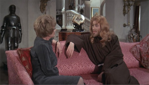 Lord Jack explains divine revelation to Lady Claire in "The Ruling Class" (1972)