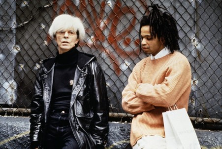 David Bowie as Andy Warhol and Jeffrey Wright as Basquiat in Basquiat, (1996).