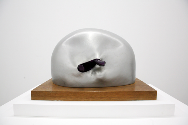 Ken Price, Silver, 1961, acrylic and lacquer on fired ceramic with artist’s wood base, 12 x 13.5 x 18", courtesy Parrasch Heijnen Gallery.