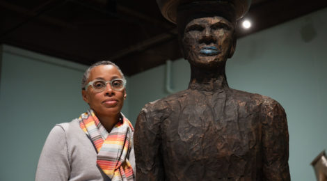 jill moniz with Alison Saar's Smokin' Papa Chaud, 2001 Photo: Tito Molina, HRDWRKER courtesy of CAAM